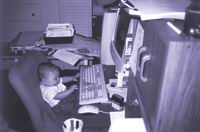 Caleb Barrone at Daddy's computer