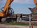 3.jpg: Allen County Highway Department workmen wait for the culvert's arrival